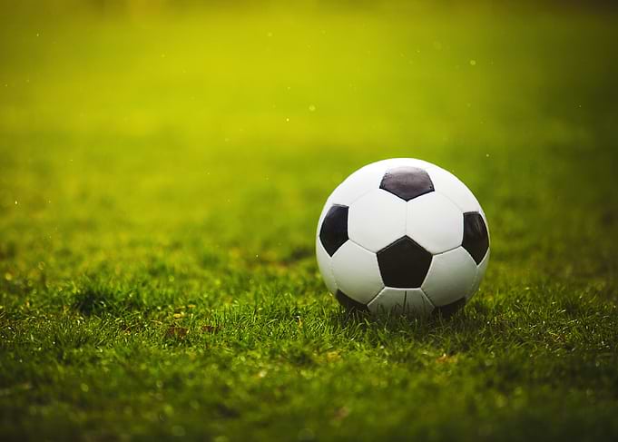Soccer ball on green grass field