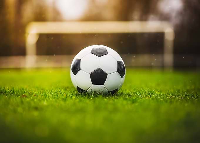 Soccer ball on green grass field