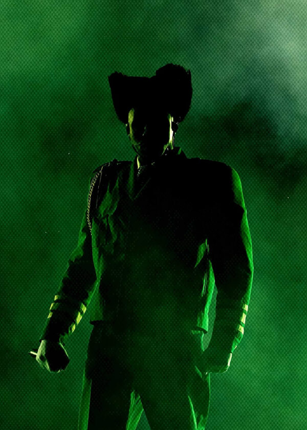 Man in Shadow with Green Lighting